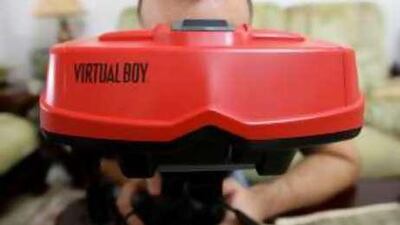 The collector Mohammed Omran using his vintage Nintendo Virtual Boy game system at his home in Sharjah.