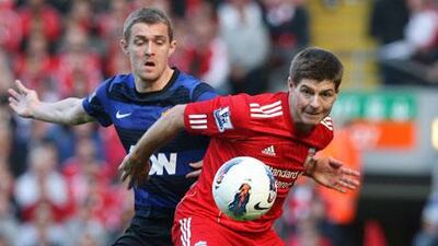 Steven Gerrard, right, scored against Manchester United on his first game for Liverpool since March 1.