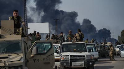 Syrian army forces head to the villages of the Latakia countryside and the Syrian coast with heavy weapons to fight against the fighters linked to Syria's ousted leader Bashar Al Assad. Getty Images