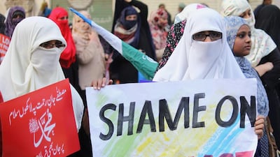 Activists and supporters of Pakistani political and Islamic party Jammat-e-Islami (JI) gather to takes a part of “Shaan.e. Mustafa Million March”, a protest against decision by the controversial French magazine ‘Charlie Hebdo’ to publish a depiction of the Prophet Muhammad. According to local reports thousands of Pakistanis rallied for a fourth day in major cities, burning the French flag and effigies, calling for the banning of the controversial French magazine. Rana Sajid Hussain / Pacific Press / Getty Images
