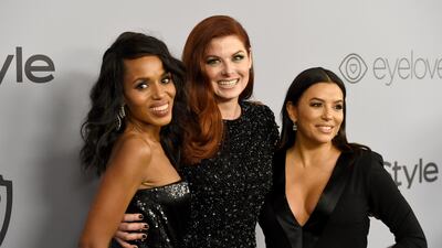 Kerry Washington, Debra Messing, and Eva Longoria. AP