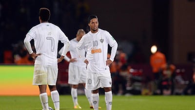 Ronaldinho, centre, of Atletico Mineiro looks dejected during the FIFA Club World Cup semi-final against Raja Casablanca on Wednesday. Lars Baron / Getty Images