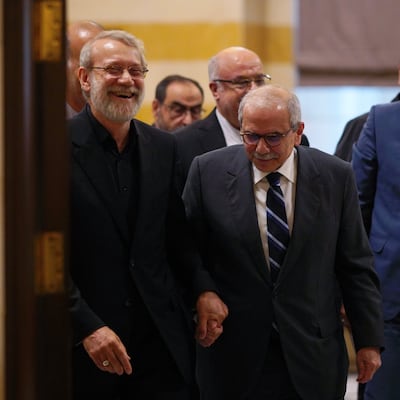 Ali Larijani holding hands with the Lebanese PM Nawaf Salam. Photo: Ali Larijani