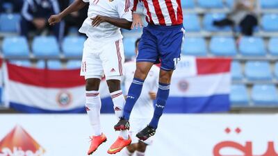 Ahmed Khalil, left, of the UAE challenges for a header during a friendly match against Paraguay in Austria on September 7, 2014. Photo Courtesy UAE FA