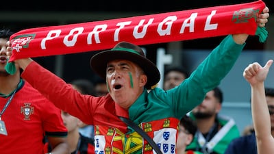 A Portugal fan cheers ahead of the 2026 World Cup round of 32 football match between Portugal and Croatia at the Toronto Stadium in Toronto. AFP