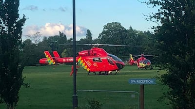 A photograph received courtesy of the Twitter user @Cogp79 shows two air ambulances responding in central Reading following a stabbing incident. AFP PHOTO via Cogp79