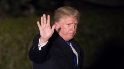 US president Donald Trump waves as he walks out to the South Lawn of the White House to depart by Marine One, in Washington, DC, on January 24, 2018. Michael Reynolds / EPA