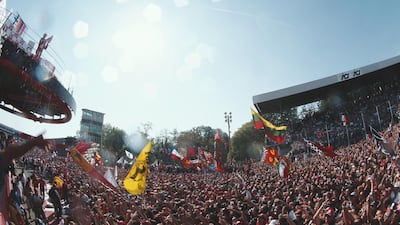 Ferrari driver Michael Schumacher salutes the flag waving Tifosi in 2006. Getty