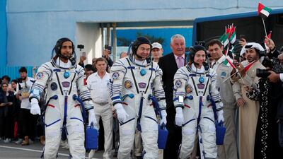 Major Hazza Al Mansouri, Commander Oleg Skripochka and Jessica Meir walk to the launch pad at Baikonur Cosmodrome two hours before blast-off. Shamil Zhumatov / Reuters