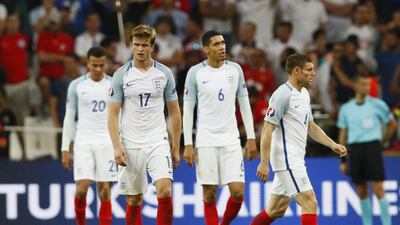 England players look dejected after Russia’s Vasili Berezutski scores their first goal in their Euro 2016 match. Jason Cairnduff / Reuters