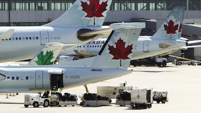 Above, Air Canada aircraft parked at Toronto Pearson International Airport. Mark Blinch / Reuters