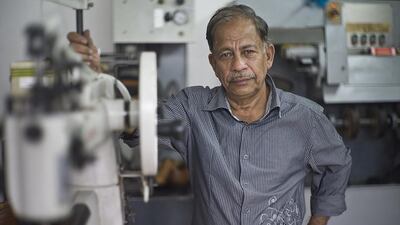 Cobbler Aslam Ali has made a living in what he calls an ‘odd field’ in Abu Dhabi for many years. Delores Johnson / The National
