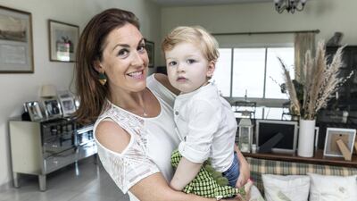 Laetitia Tregoning, 43, with her two-year-old son Edward. Ms Tregoning says she saw a change in her son's behaviour after he stopped going to the nursery last year due to the coronavirus pandemic. All photos by Antonie Robertson / The National