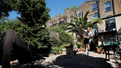 British tennis player Dominic Inglot during a training session in his garden in Chiswick. Reuters
