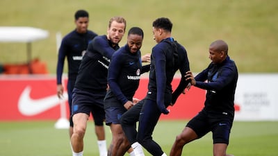 Harry Kane, Raheem Sterling, Jesse Lingard and Ashley Young in action during a training session at St Georges Park on May 28, 2018 in Burton-upon-Trent, England. Carl Recine / Reuters