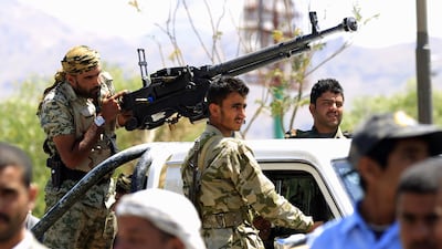 Houthi fighters guard a pro-rebel gathering in Sanaa on September 27, 2018. AFP