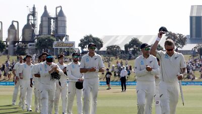 New Zealand's Neil Wagner, right, leads his victorious teammates from the field. AP