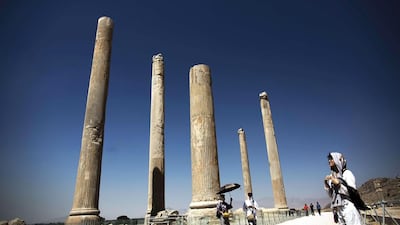 A Chinese tourist in September among the columns in the ancient city of Persepolis, one of Iran’s main attractions. Behrouz Mehri / AFP