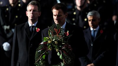 UK Foreign Secretary Jeremy Hunt lays a wreath at the Cenotaph in London on November 11, 2018, at the First World War Armistice centenary memorial. Getty