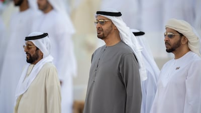 Sheikh Mohamed; Sheikh Tahnoon bin Mohamed, Ruler's Representative in Al Ain Region; and Sheikh Hamdan bin Zayed, Ruler’s Representative in Al Dhafra Region, stand for the national anthem. Rashed Al Mansoori / Presidential Court