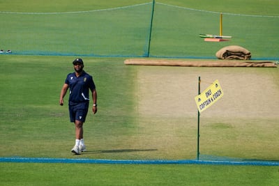 South Africa captain Temba Bavuma inspects the Kolkata pitch ahead of the first Test against India. AP