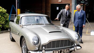 Britain's Prince Charles (R), Prince of Wales meets British actor Daniel Craig as he tours the set of the 25th James Bond Film at Pinewood Studios in Iver Heath, west of London in June 2019. AFP