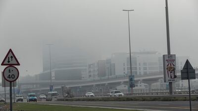 Heavy fog envelopes Sheikh Zayed Road in Al Barsha, Dubai. Antonie Robertson / The National