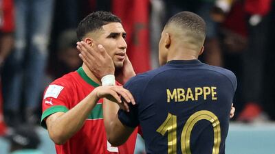 France's Kylian Mbappe comforts Morocco's Achraf Hakimi at the end of the Qatar 2022 World Cup semi-final. AFP