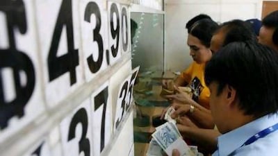 Punitive money transfer fees annoy migrants when they repatriate small amounts. Cheryl Ravelo / REUTERS