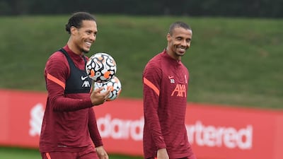 Virgil van Dijk and Joel Matip during Liverpool's training session at AXA Training Centre.