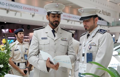 Abu Dhabi Police's Maj Ahmad Al Shamsi (left) said the tolls will help road safety and management. Pawan Singh / The National