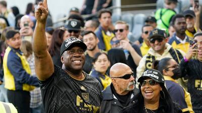 Los Angeles FC chairman and CEO Magic Johnson, left, celebrates after defeating the Philadelphia Union. AP