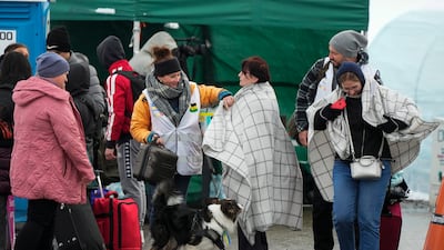 More than 2 million refugees have crossed into Poland from Ukraine since the war started. Britain has retained a visa requirement for Ukrainians to enter the UK on security grounds. AP