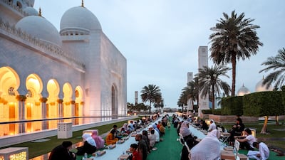 Thousands of Muslims come together to enjoy iftar events at the landmark place of worship each year, in what has become a beloved tradition. Victor Besa / The National