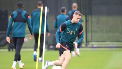 Jordan Henderson attends Liverpool's training session. AFP