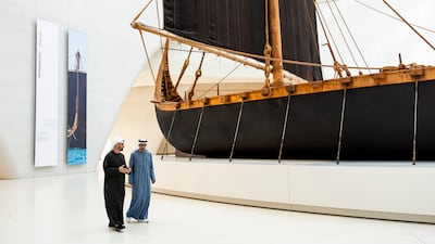 Sheikh Mohamed and Sheikh Abdullah speak at the Zayed National Museum before meeting Mr Macron