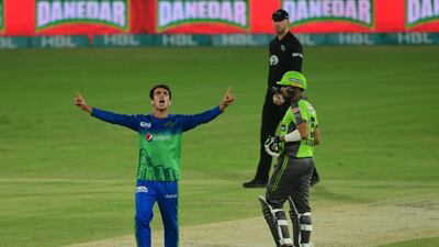 Multan Sultans' Mohammad Ilyas celebrates after taking the wicket of Lahore Qalandars' Sohail Akhtar. AFP