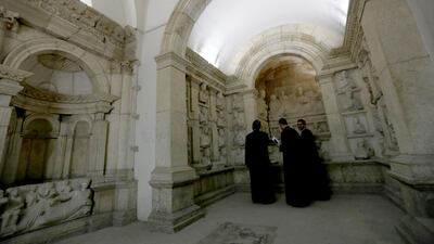 Priests visit the national antiquities museum in the Syrian capital Damascus on October 28, 2018.