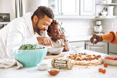 Make a meal from scratch with children to demonstrate the reward gained from sustained effort. Jimmy Dean / Unsplash