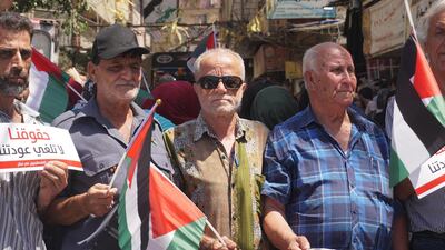 Dib Tout, centre, head of the local popular committee, at the protest at the Palestinian Burj Al Barajneh camp on August 23, 2019 in Lebanon. Sunniva Rose / The National