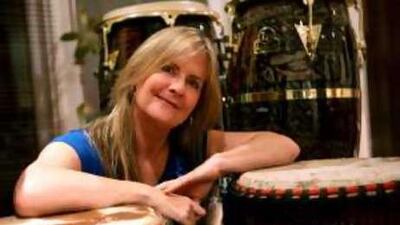 Julie-Ann Odell with her drums in Jebel Ali's Green Community.