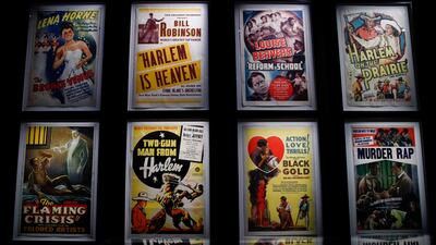 A collection of 'race films' posters on display during a media preview for the exhibition. EPA