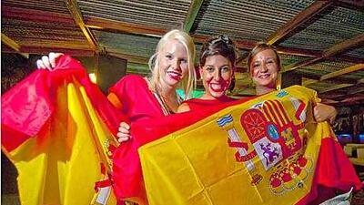Spanish supporters, from left, Dana Bettell, Cristina Martinmunoz and Amaia Delgado watched the semi-final game against Germany at the Barasti Bar in Dubai.