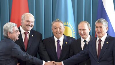 Armenia's president Serzh Sargsyan (L-R), Belarus' president Alexander Lukashenko, Kazakhstan's president Nursultan Nazarbayev, Russia's president Vladimir Putin and Kyrgyzstan's president Almazbek Atambayev pose for a family photo at the Burabai resort near Astana, Kazakhstan, on October 16, 2015. Aleksey Nikolskyi/RIA Novosti/Kremlin/Reuters