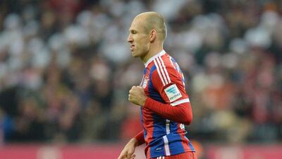 Bayern Munich's Arjen Robben celebrates after scoring the opening goal in his side's win against Freburg on Tuesday in the Bundesliga. Christof Stache / AFP / December 16, 2014