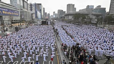 Taekwondo practitioners at a demonstration event at Gwanghwamun Square in Seoul. AFP