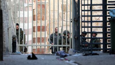 Israeli troops around Al Ibrahimi Mosque in Hebron, the West Bank, on April 10. EPA