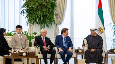 President Sheikh Mohamed with Tengku Hassanal Ibrahim Alam Shah, Crown Prince of Pahang, and Razan Al Mubarak, president of the IUCN. Ryan Carter / UAE Presidential Court