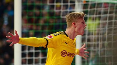 Erling Braut Haaland celebrates after scoring Dortmund's second goal. AFP
