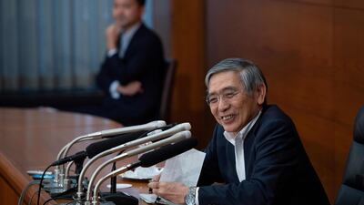 Bank of Japan's governor Haruhiko Kuroda speaks during a press conference about the monetary policy, at the bank's Tokyo headquarters. Mr Kuroda defended a decision to continue the country's ultra-loose monetary policy on June 15, even as the US Federal Reserve and European Central Bank tighten their policies. / AFP / Martin BUREAU